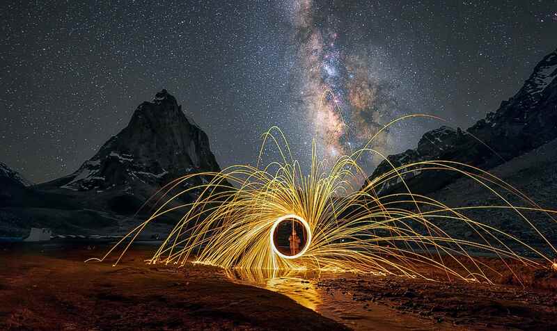 Zero with sparklers and Milky Way